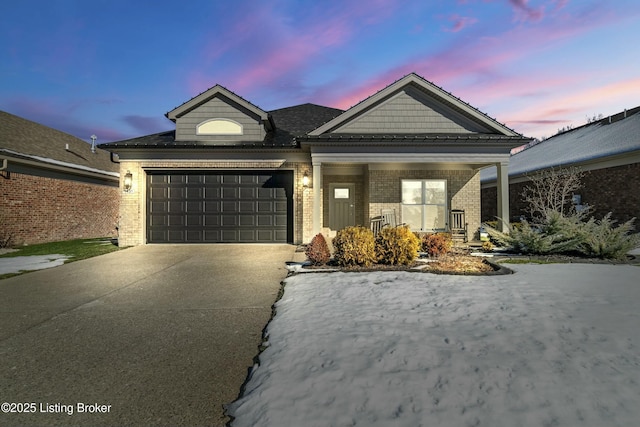 view of front of home with a garage