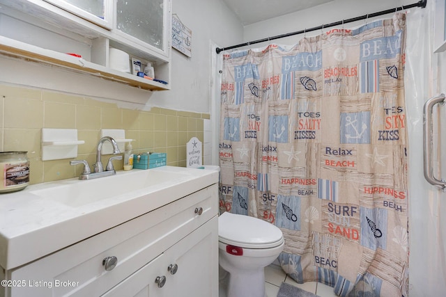 bathroom with vanity, a shower with curtain, decorative backsplash, tile walls, and toilet