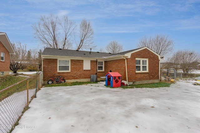 rear view of property with central air condition unit