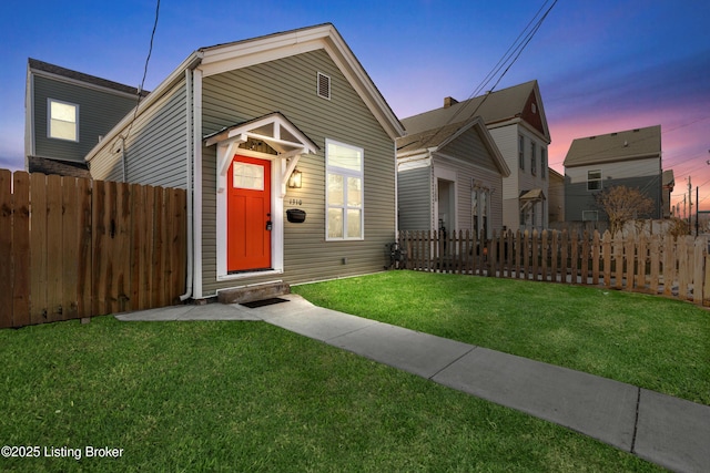 view of front of home featuring a yard