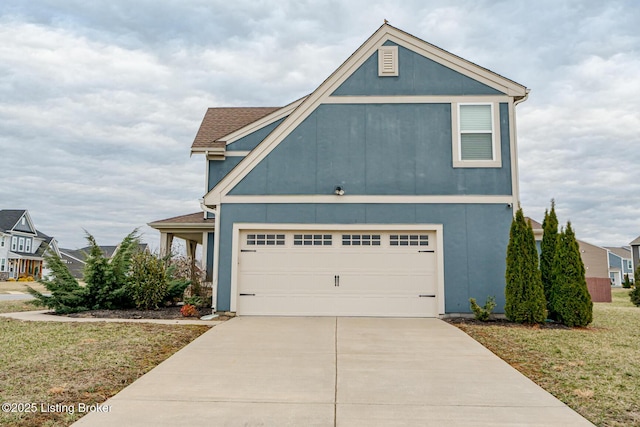 view of front of house featuring a front yard and driveway