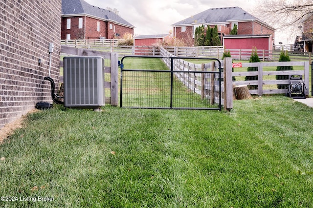 view of yard with central AC