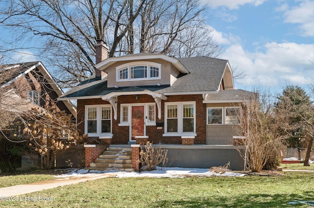 view of front of home with a front yard