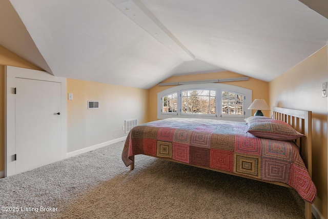 bedroom featuring carpet floors and lofted ceiling with beams