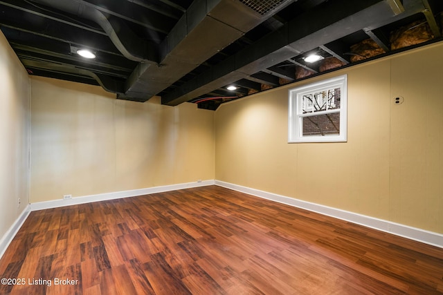 basement featuring hardwood / wood-style flooring