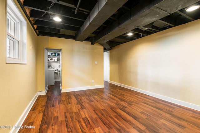 basement featuring dark hardwood / wood-style floors