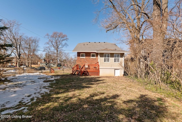 back of house with a yard