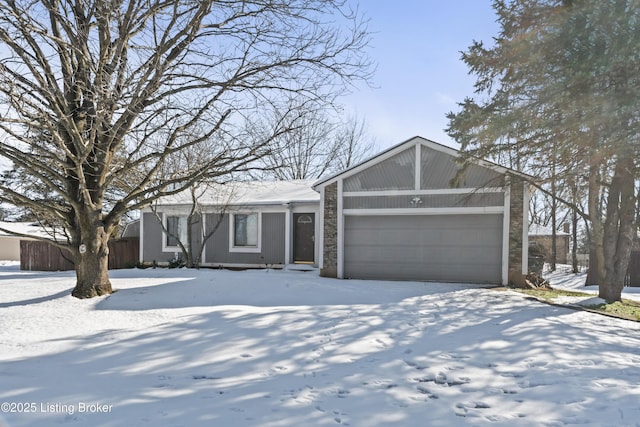 single story home featuring a garage