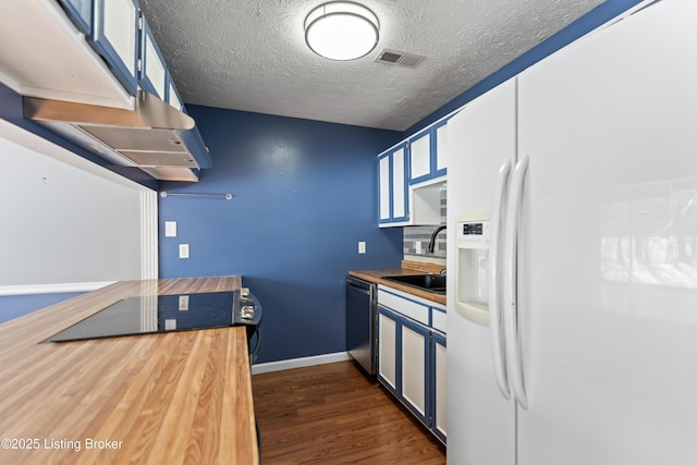 kitchen featuring dishwasher, dark hardwood / wood-style floors, sink, a textured ceiling, and white fridge with ice dispenser