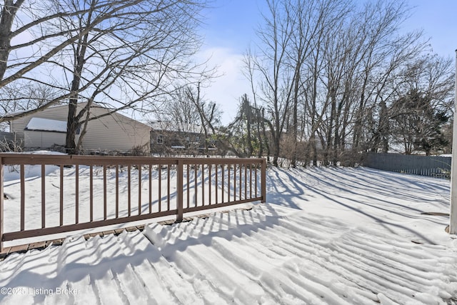 view of snow covered deck