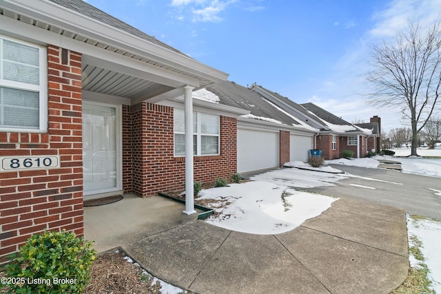 view of property exterior featuring a garage