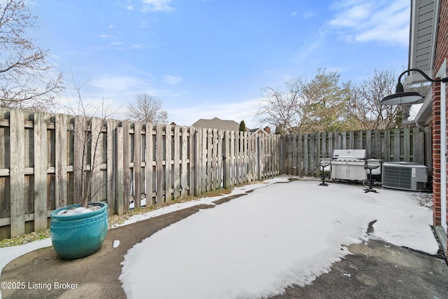 view of patio with a grill and central AC