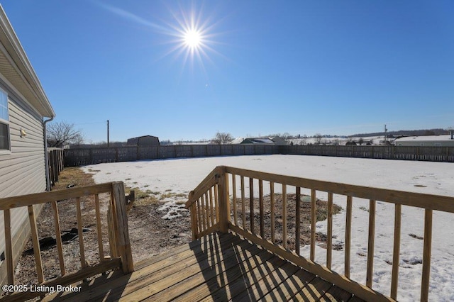 view of snow covered deck