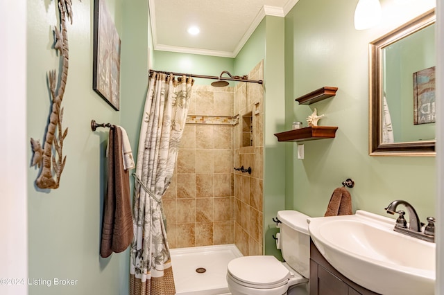 bathroom with toilet, vanity, a shower with curtain, and crown molding