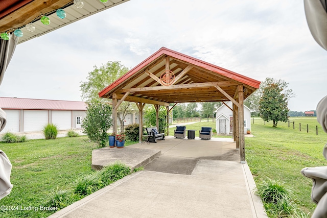 view of patio featuring a storage shed