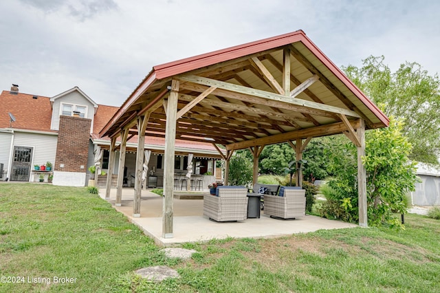 surrounding community featuring a patio area and a yard