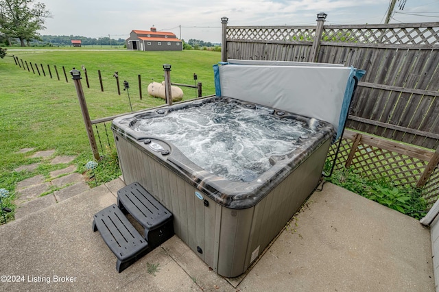 view of patio featuring a hot tub