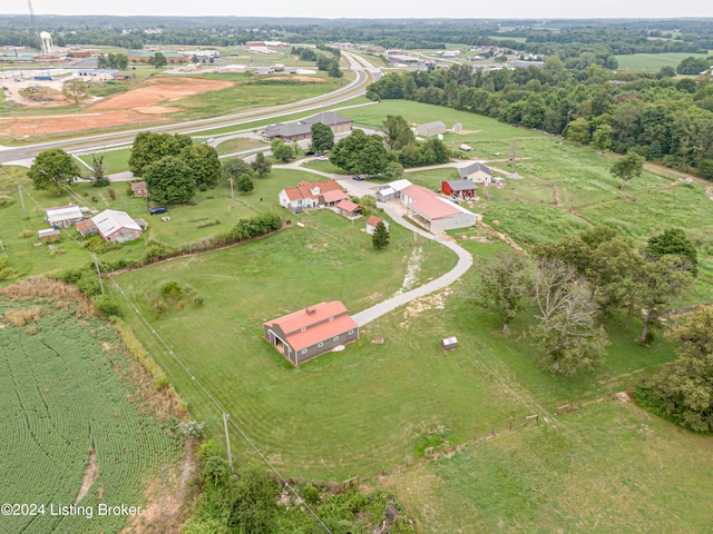 birds eye view of property featuring a rural view