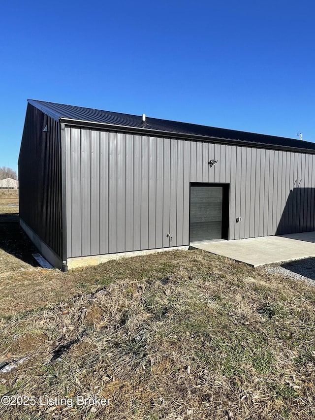 view of outbuilding featuring a garage