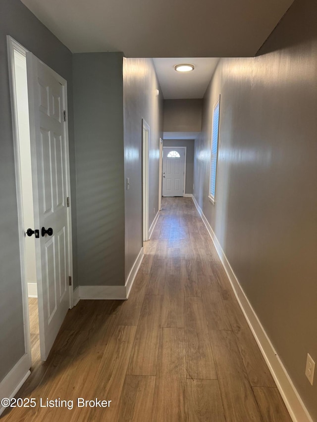 hallway featuring hardwood / wood-style floors