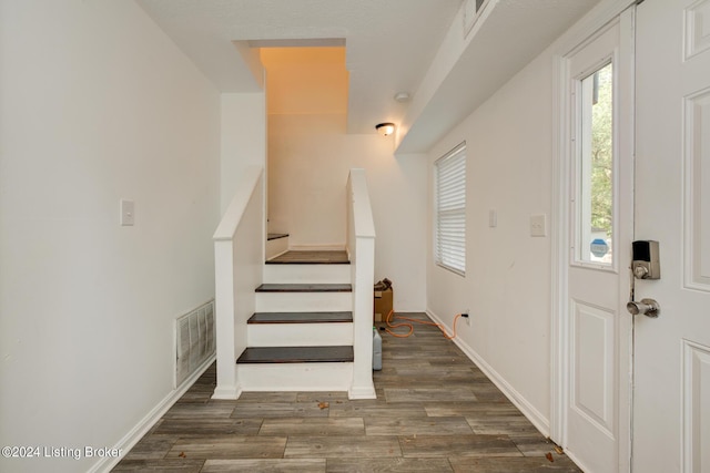 entryway featuring dark hardwood / wood-style floors