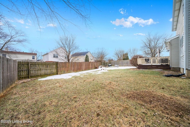 view of yard featuring a wooden deck