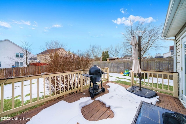 view of snow covered deck