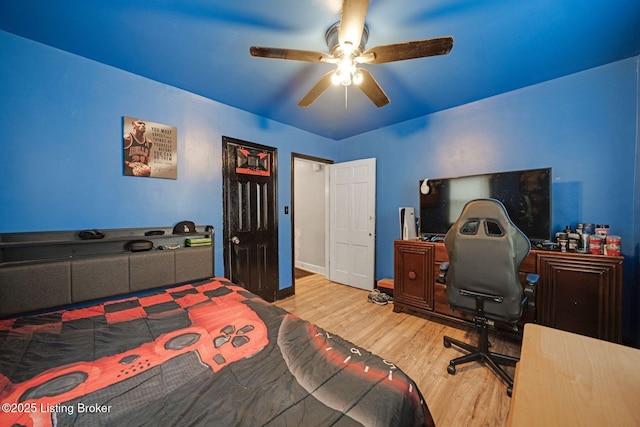 bedroom featuring ceiling fan and wood-type flooring