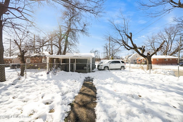 exterior space with a carport