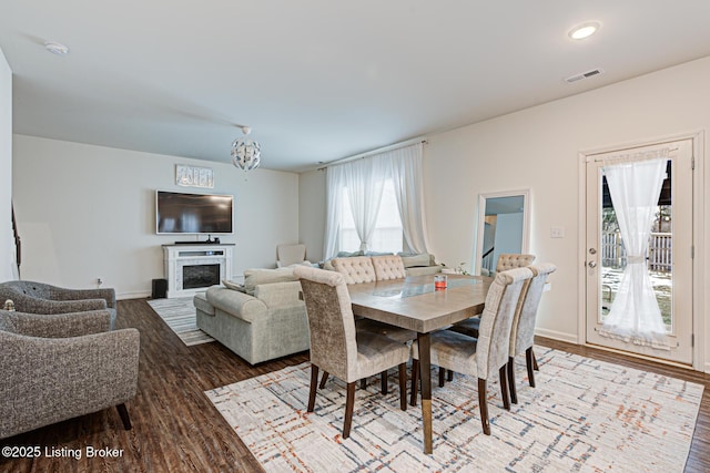 dining area with wood-type flooring