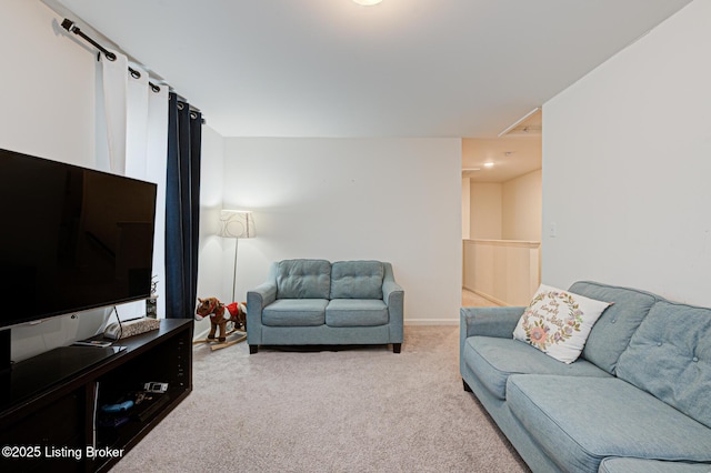 living room featuring light carpet