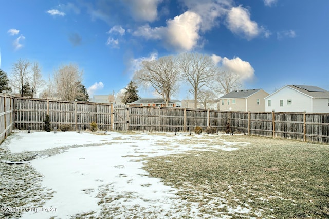 view of yard covered in snow