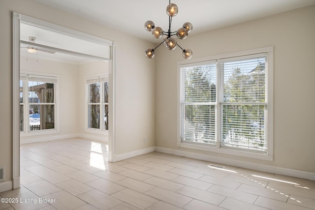 spare room featuring a chandelier, visible vents, baseboards, and light tile patterned floors