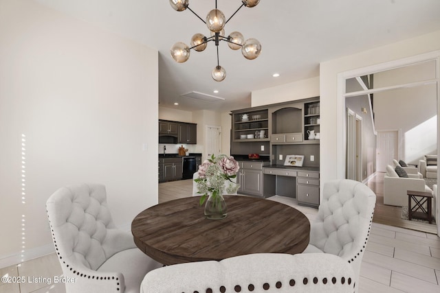 dining room featuring recessed lighting and an inviting chandelier