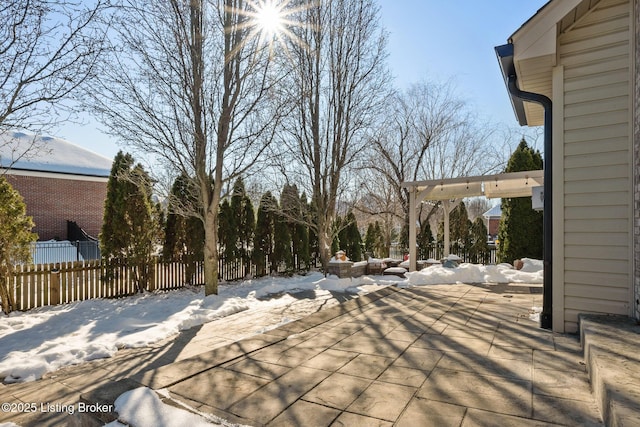 view of snow covered patio