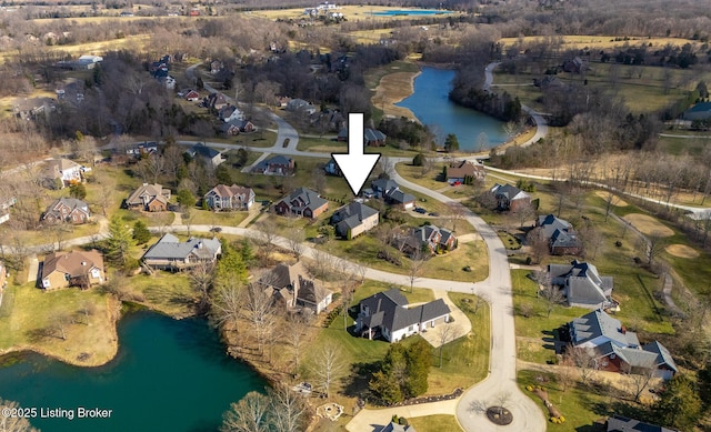 aerial view with a water view and a residential view