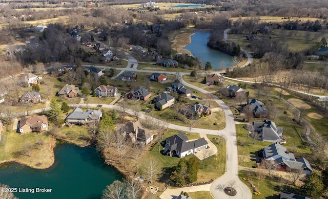 bird's eye view featuring a water view and a residential view