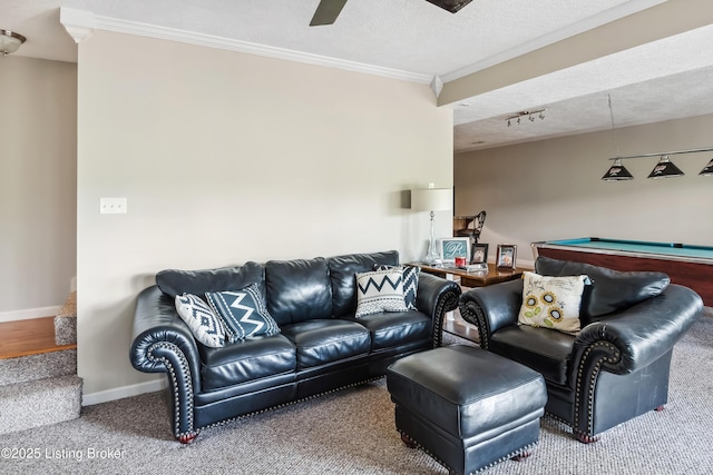 carpeted living room featuring ceiling fan, a textured ceiling, billiards, and crown molding