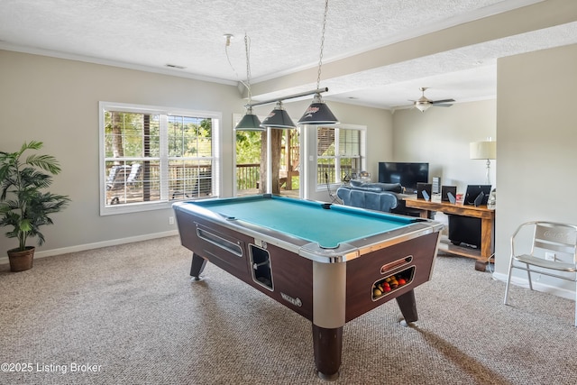 recreation room featuring carpet floors, crown molding, and a textured ceiling