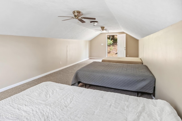 carpeted bedroom with ceiling fan and lofted ceiling