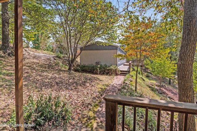 view of yard featuring a deck