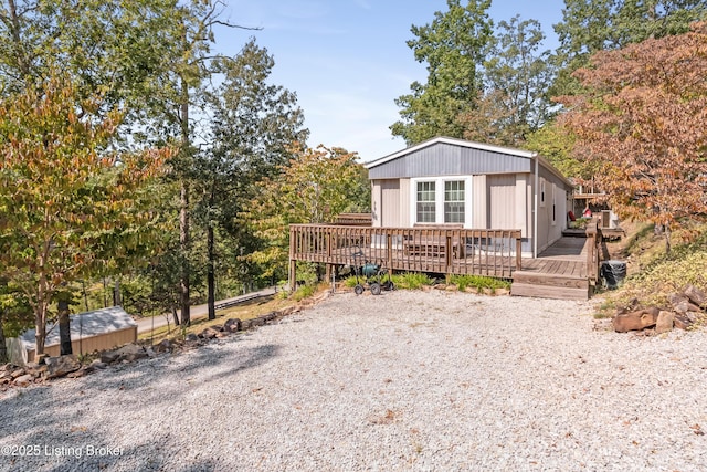 view of front of house with a wooden deck