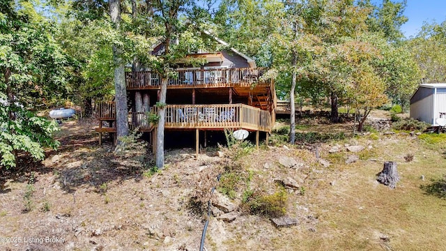 rear view of property with a deck