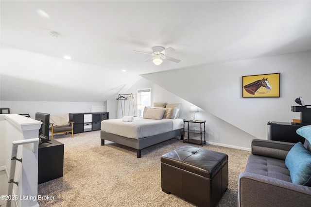 carpeted bedroom featuring lofted ceiling and ceiling fan