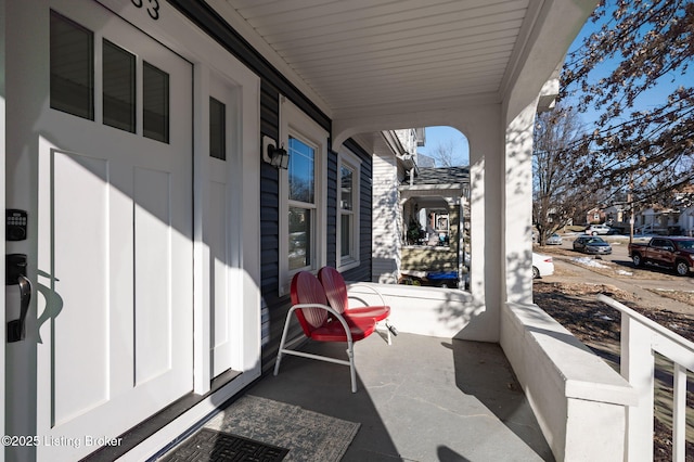 view of patio featuring a porch