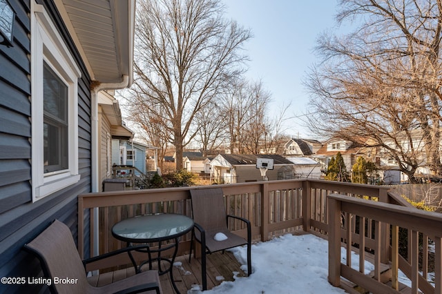 view of snow covered deck