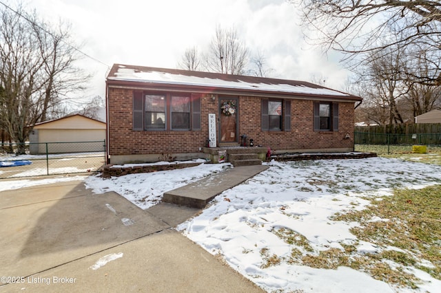 view of front of house featuring an outbuilding and a garage