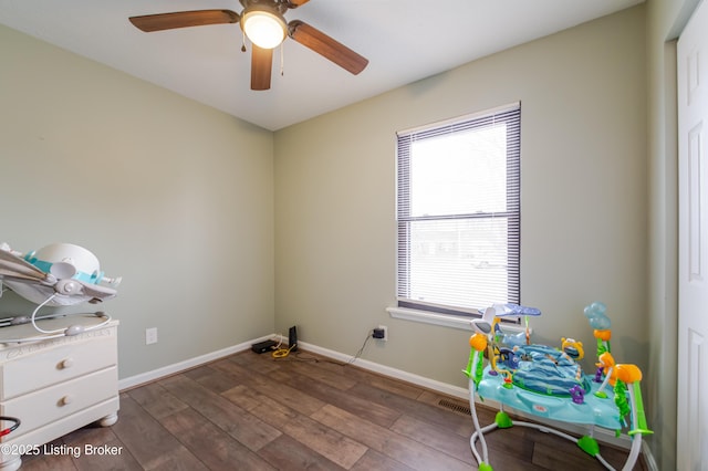 interior space with hardwood / wood-style floors and ceiling fan