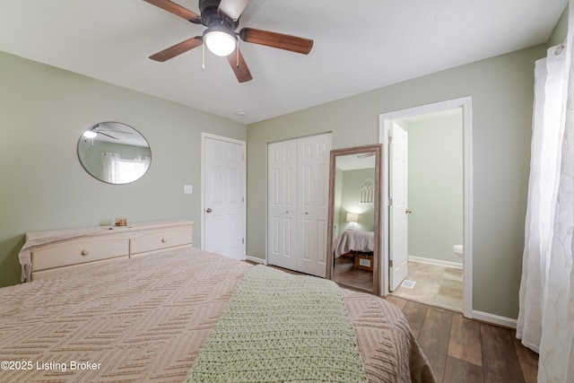 bedroom featuring ceiling fan, connected bathroom, and light wood-type flooring