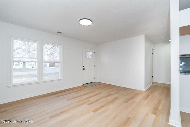 foyer entrance featuring light hardwood / wood-style floors